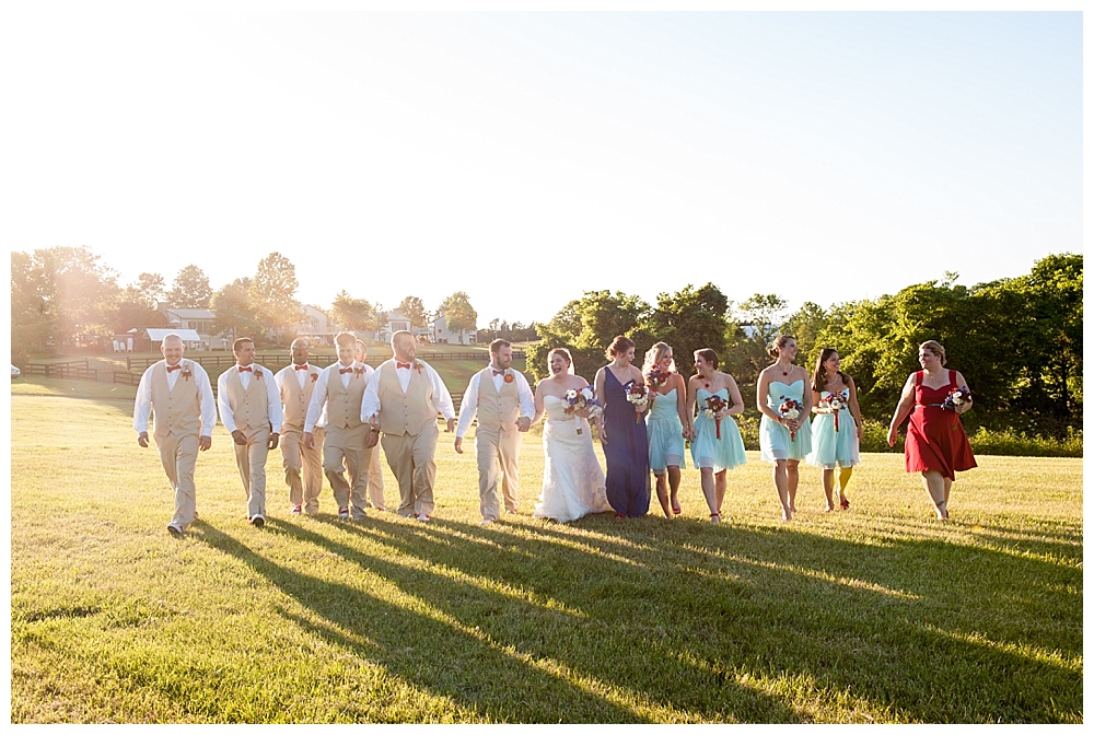 wedding party sunset backlit walking