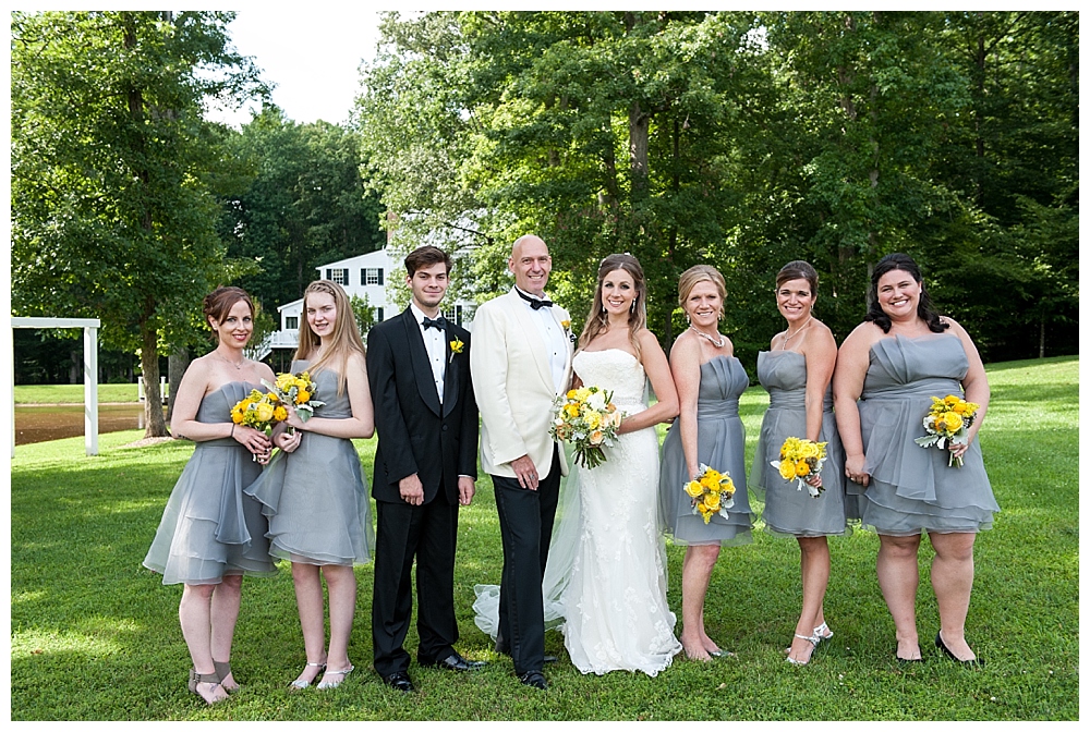 wedding party tuxedos, grey dresses, yellow bouquets