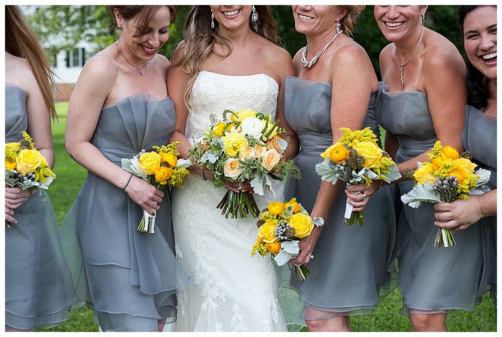 wedding party tuxedos, grey dresses, yellow bouquets