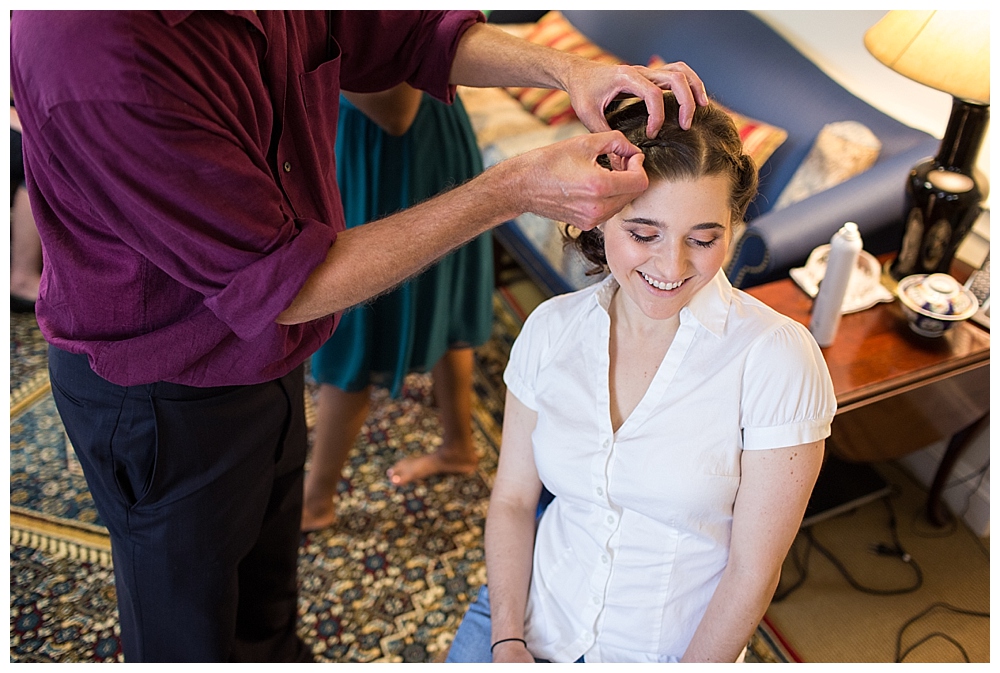 bride getting hair done