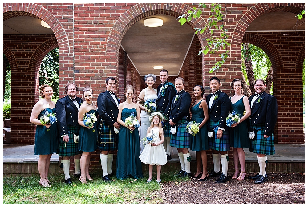 bridal party in kilts and green dresses