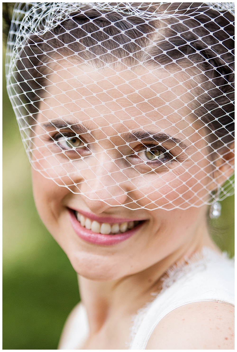 Bridal portrait with birdcage veil