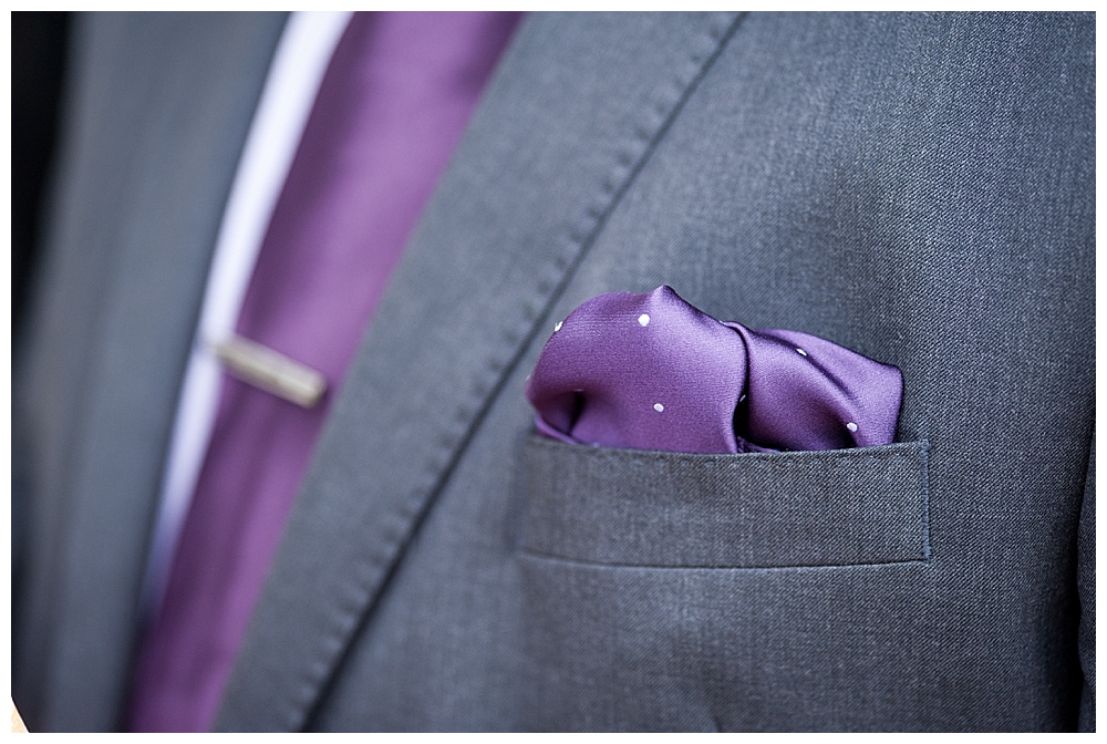 purple tie gray suit groom