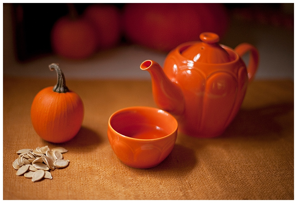 orange teapot and cup