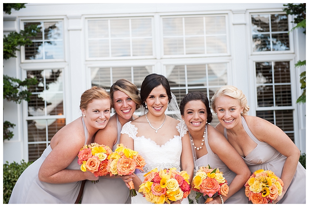 bridal party grey dresses yellow orange flowers