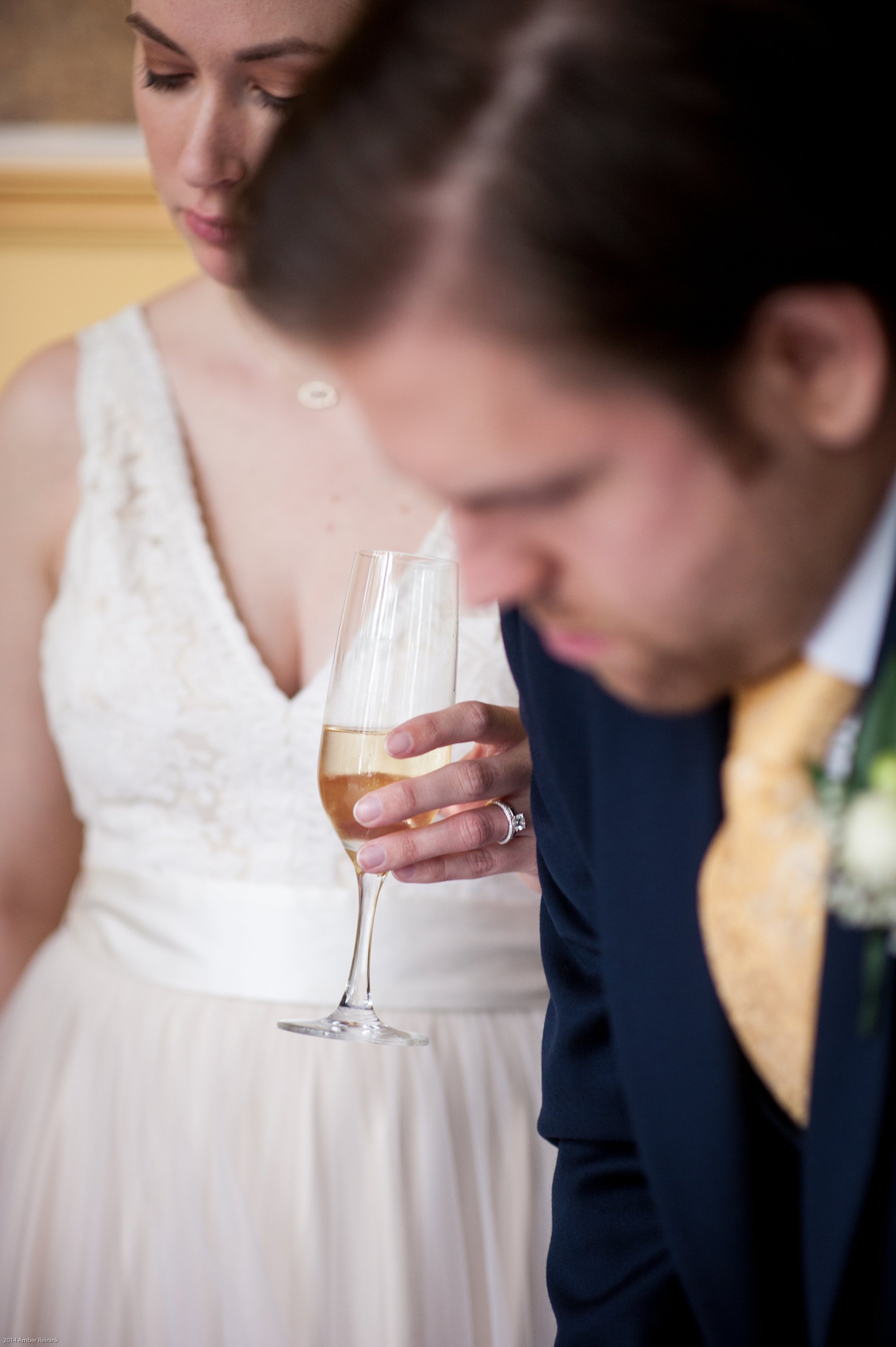 bride and groom sipping champagne during 2941 restaurant wedding Vienna Virginia