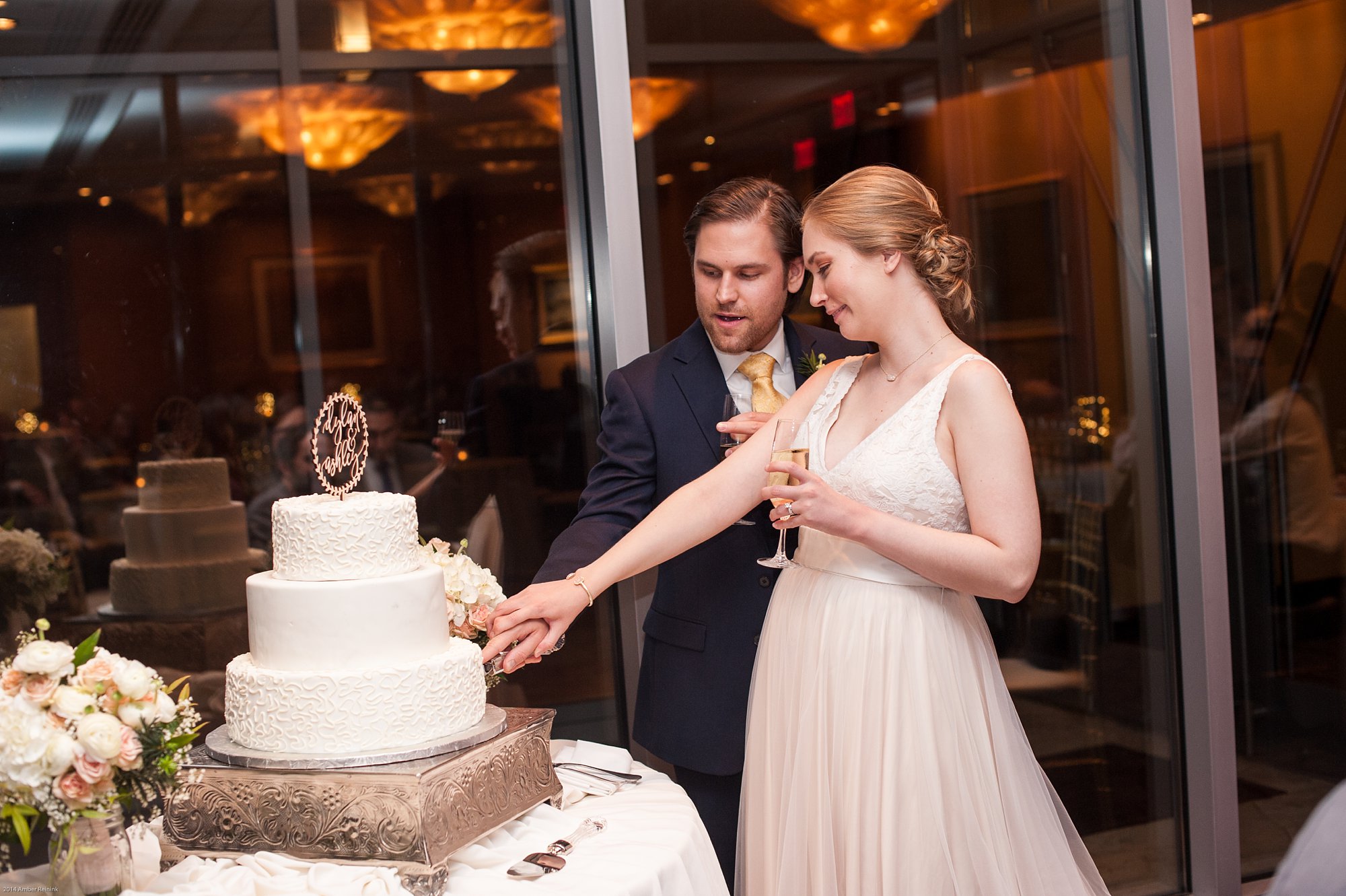 bride and groom cutting cake during 2941 Wedding Pictures Vienna Virginia