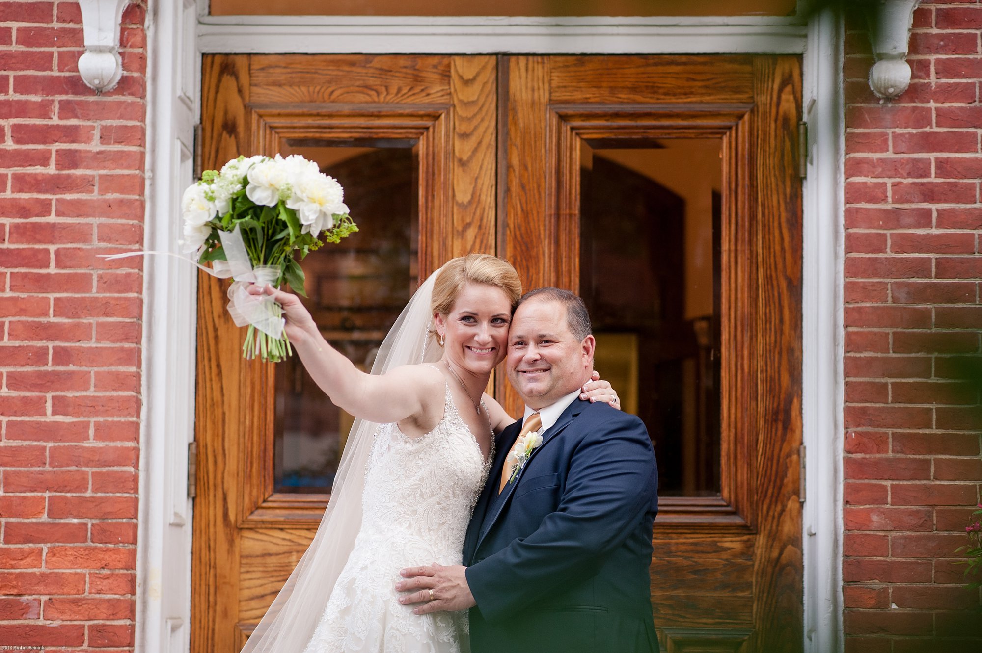 the alexandrian hotel wedding pictures Alexandria Virginia bride and groom portrait waving to guests