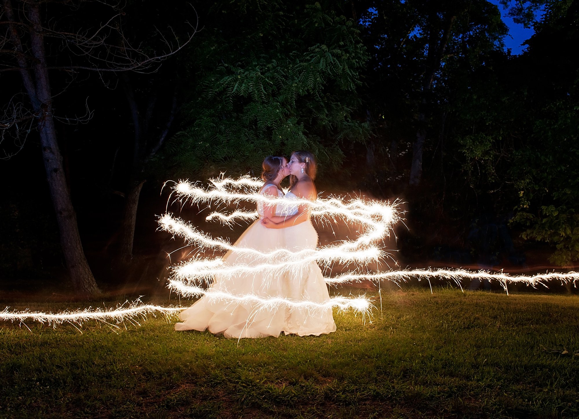two brides with sparkler trail portrait fauquier springs country club wedding Warrenton Virginia amber kay photography