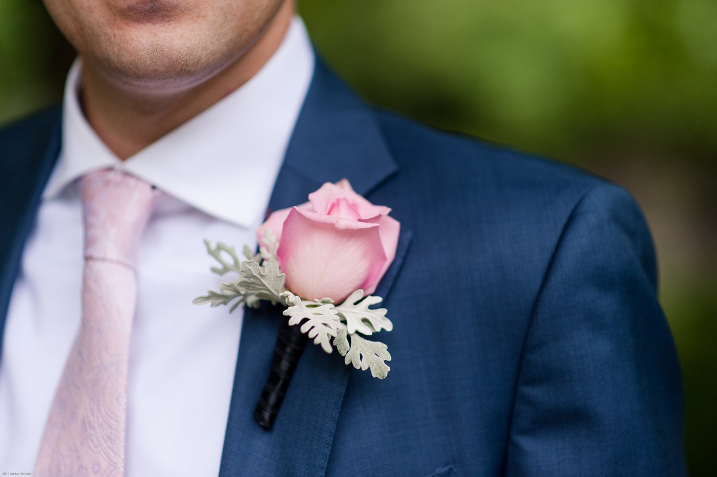 Groom wearing blue suit and pink tie at Thorpewood Mountain Memories wedding Thurmont, MD