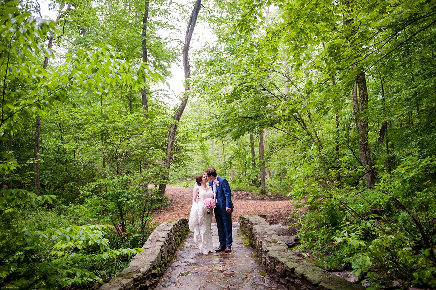 Bride and Groom on stone bridge at Thorpewood Mountain Memories wedding Thurmont, MD